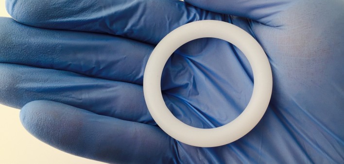 Dapivirine vaginal ring on blue gloved hand