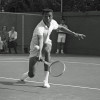 Ashe playing against Dennis Ralston at the 1964 Southern California Intercollegiates.
