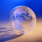 a transparent globe casting a shadow