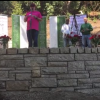 Reading names at the dedication of the Hemophilia Memorial Circle